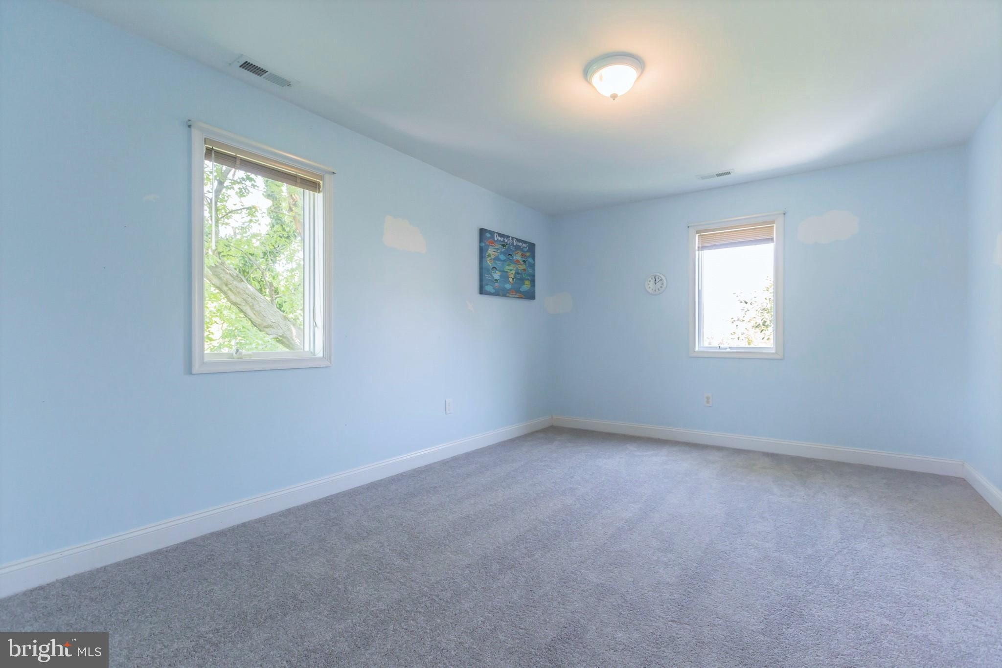 525 Coles Mill Road Haddonfield, NJ 08033 - Photo 26 of 36 an empty room with windows