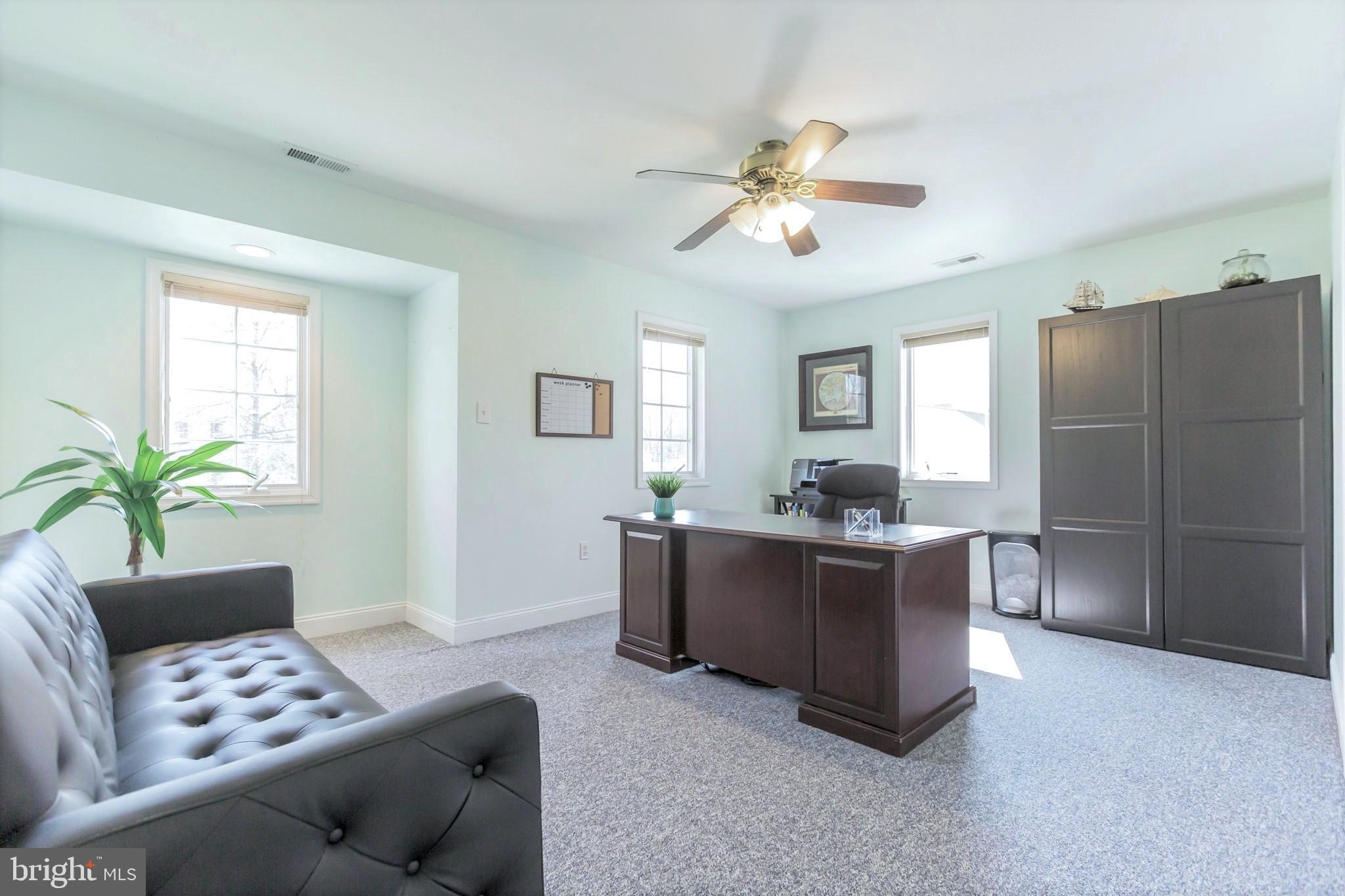 525 Coles Mill Road Haddonfield, NJ 08033 - Photo 27 of 36 a dining room with furniture and window