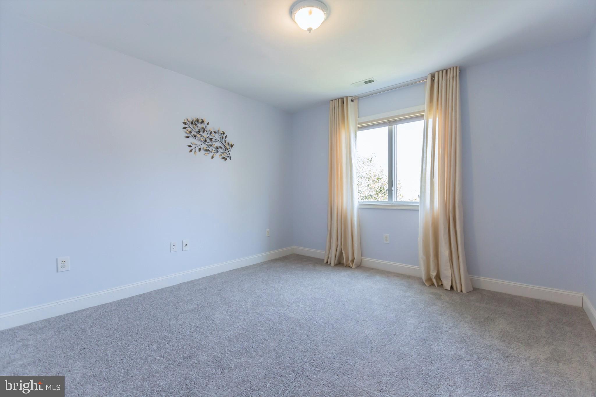 525 Coles Mill Road Haddonfield, NJ 08033 - Photo 32 of 36 an empty room with windows