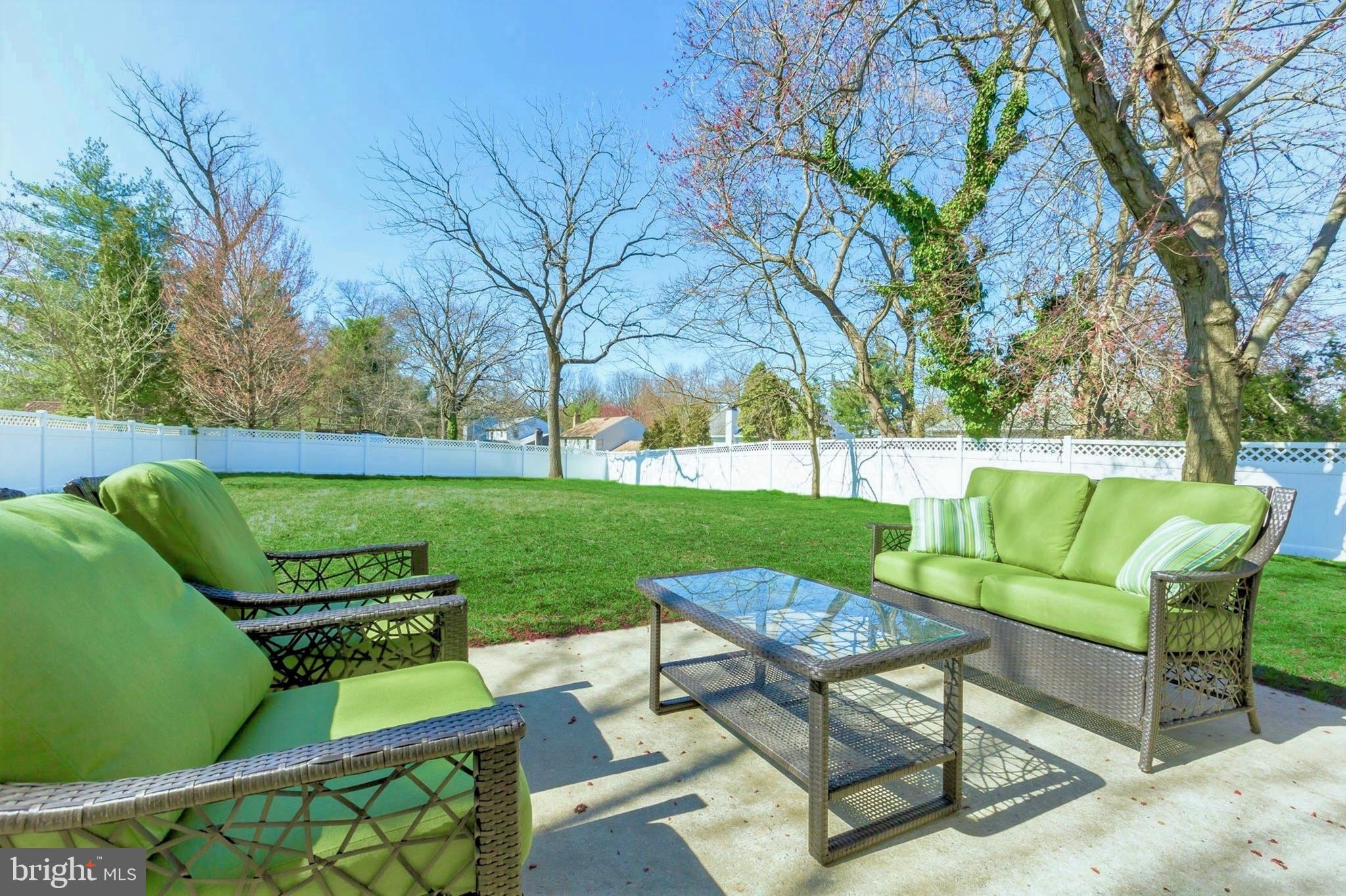 525 Coles Mill Road Haddonfield, NJ 08033 - Photo 33 of 36 a view of a two chairs in a big yard