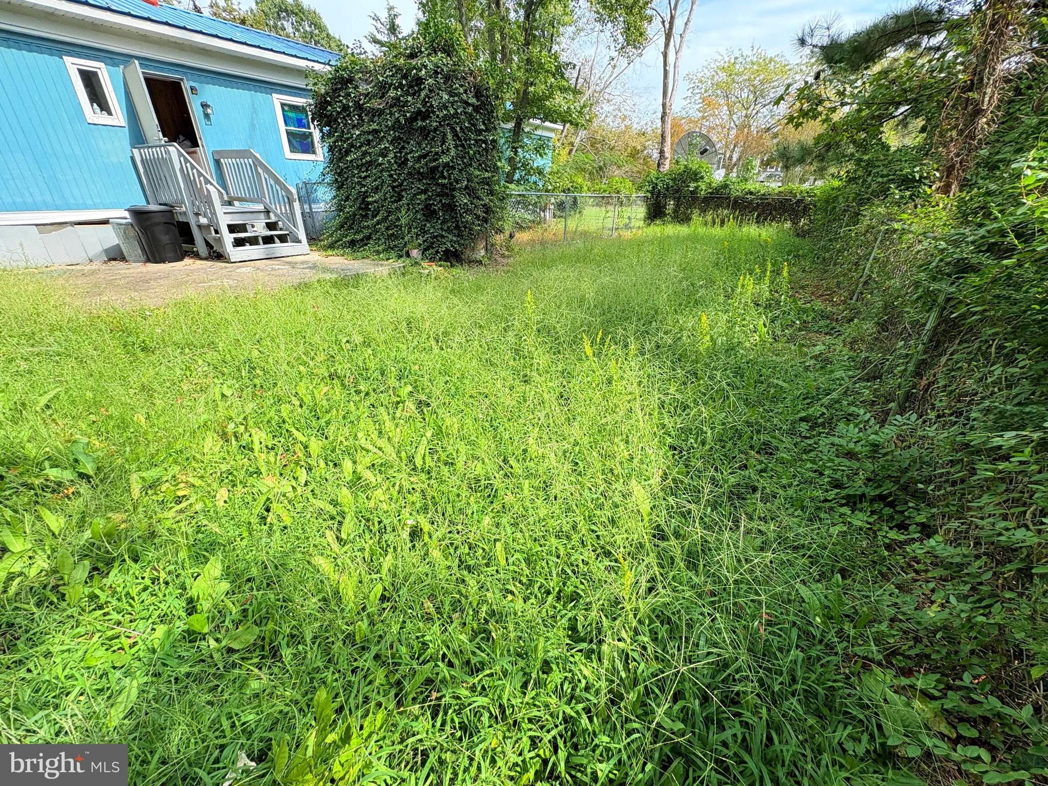 27199 Nevitte Muir Road Westover, MD 21871 - Photo 27 of 31 a house view with a garden space
