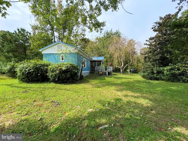 a view of a house with garden