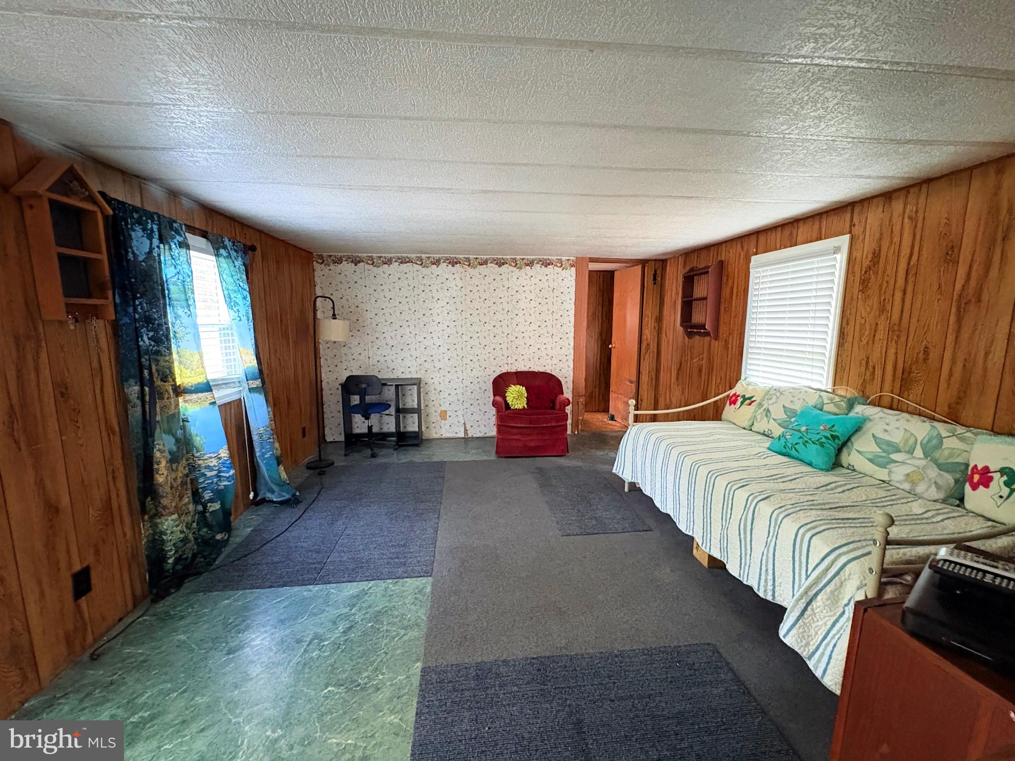 27199 Nevitte Muir Road Westover, MD 21871 - Photo 5 of 31 a bedroom with furniture and a window