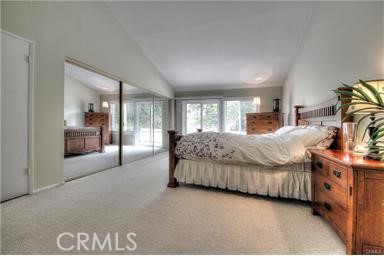 2543 Farview Road Fullerton, CA 92833 - Photo 13 of 15 a bedroom with a large bed and a couch