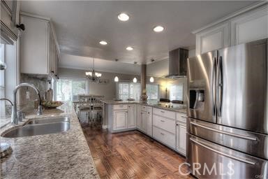 2543 Farview Road Fullerton, CA 92833 - Photo 9 of 15 a kitchen with refrigerator and cabinets