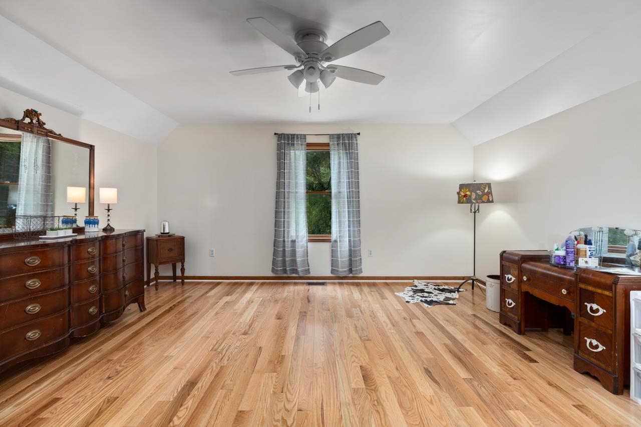 2151 Stagebridge Road Lovingston, VA 22949 - Photo 22 of 51 a bedroom with a bed and a dresser