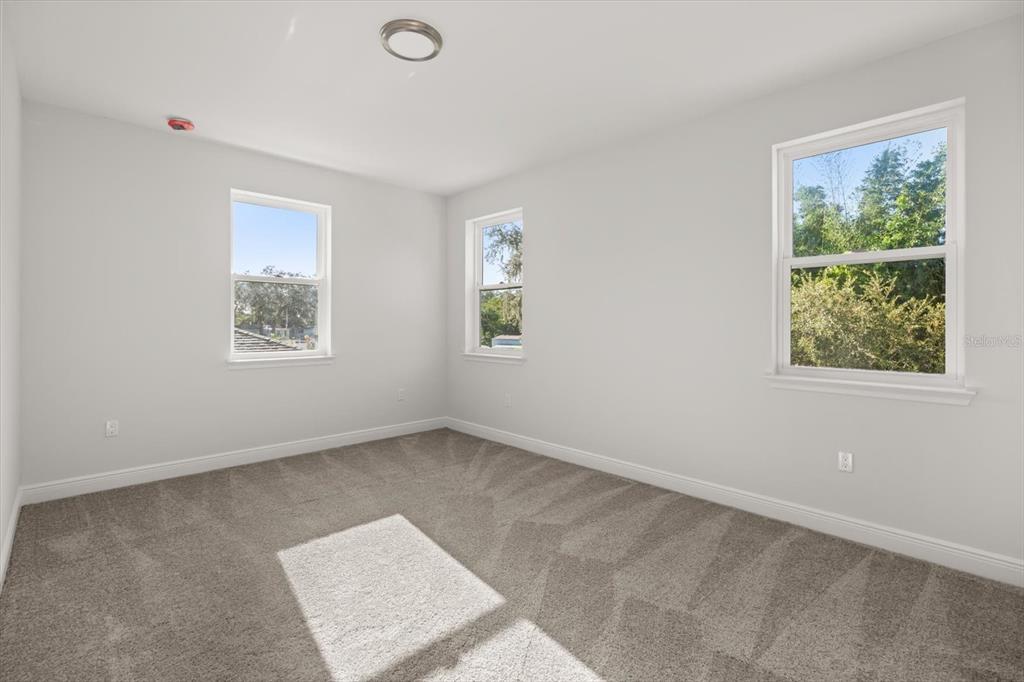 1289 Ash Tree Cove Casselberry, FL 32707 - Photo 15 of 34 a view of an empty room with a window
