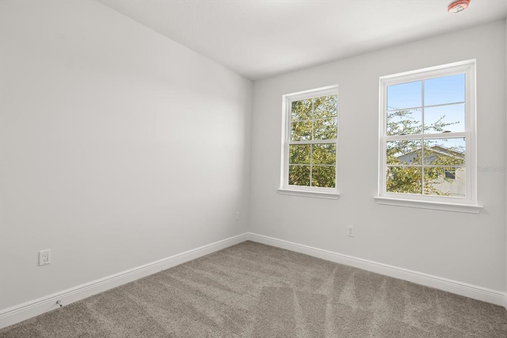 1289 Ash Tree Cove Casselberry, FL 32707 - Photo 24 of 34 an empty room with a window