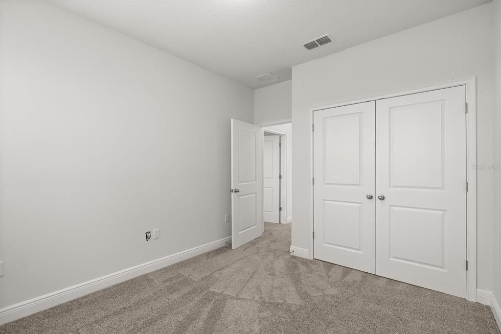 1289 Ash Tree Cove Casselberry, FL 32707 - Photo 25 of 34 a view of an empty room