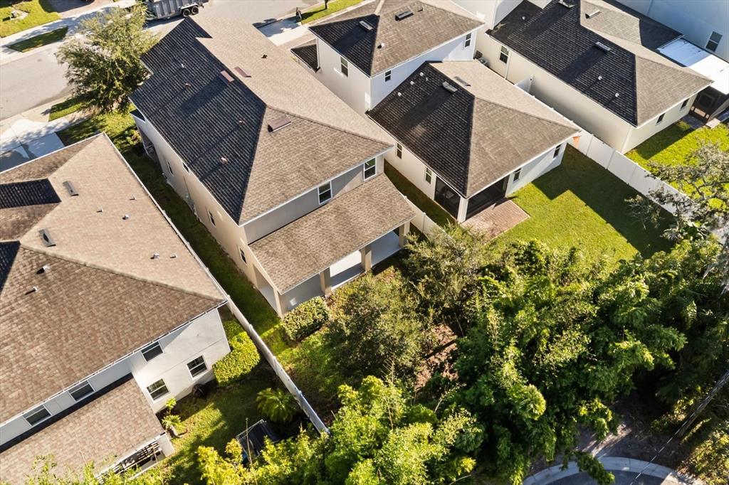 1289 Ash Tree Cove Casselberry, FL 32707 - Photo 31 of 34 an aerial view of a house with a yard