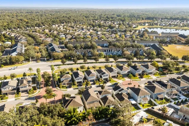 an aerial view of residential building and parking space