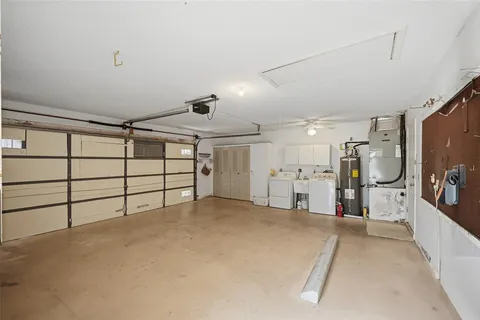 a bathroom with a shower and a sink