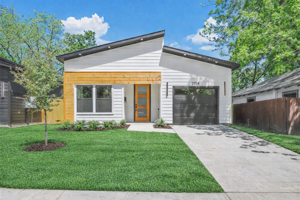 2714 Hector Street Dallas, TX 75210 - Photo 1 of 33 front view of a house with a yard