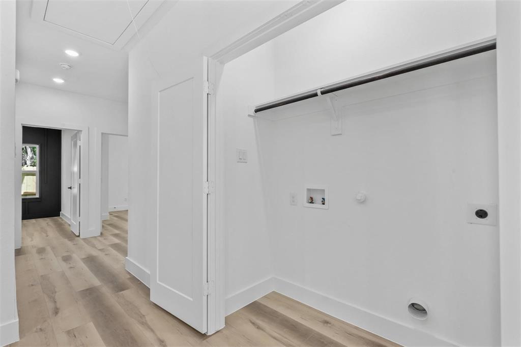 2714 Hector Street Dallas, TX 75210 - Photo 14 of 33 a view of a hallway with wooden floor