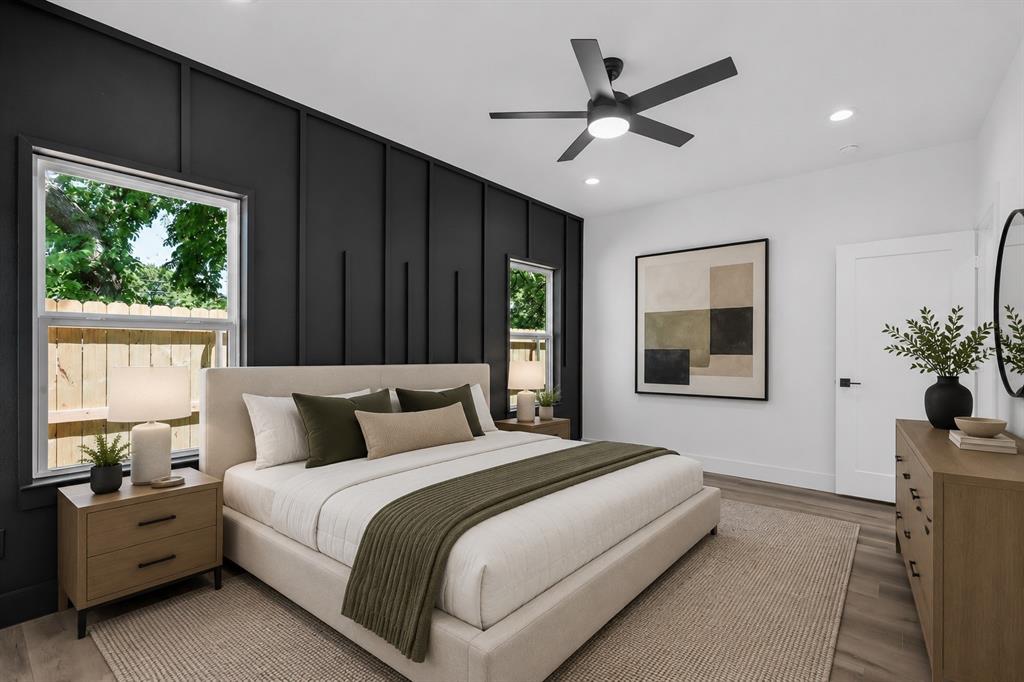 2714 Hector Street Dallas, TX 75210 - Photo 16 of 33 a bedroom with a large bed and a window