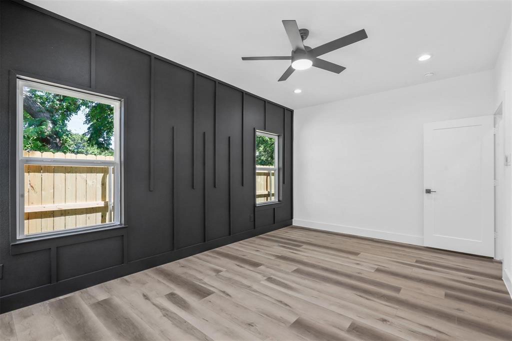 2714 Hector Street Dallas, TX 75210 - Photo 17 of 33 a view of a livingroom with a ceiling fan and window