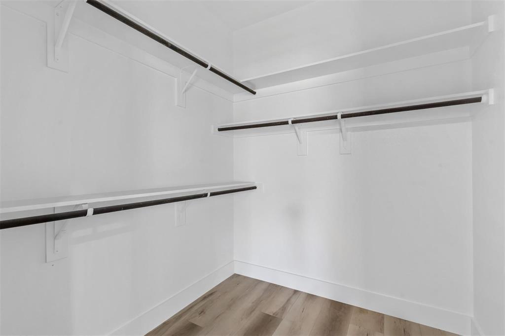 2714 Hector Street Dallas, TX 75210 - Photo 24 of 33 a view of a room with racks on the wall