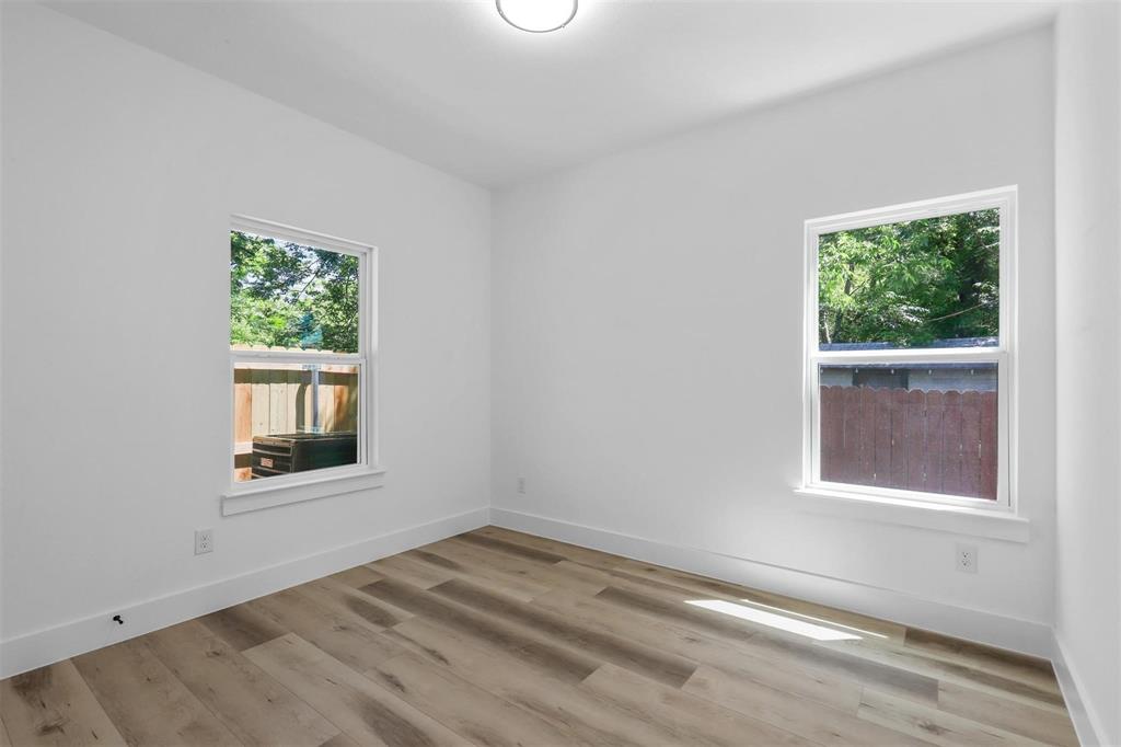 2714 Hector Street Dallas, TX 75210 - Photo 31 of 33 an empty room with a window