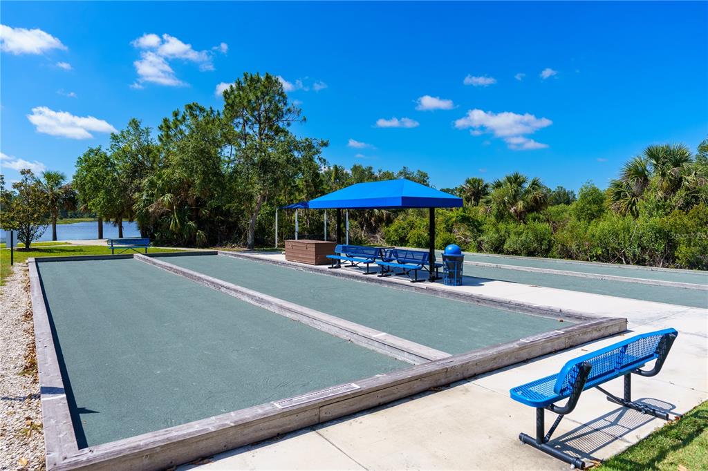 13017 Steinhatchee Loop Venice, FL 34293 - Photo 72 of 98 a view of a tennis court with a table and chairs