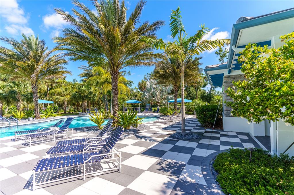 13017 Steinhatchee Loop Venice, FL 34293 - Photo 78 of 98 a view of a chair and table in the patio