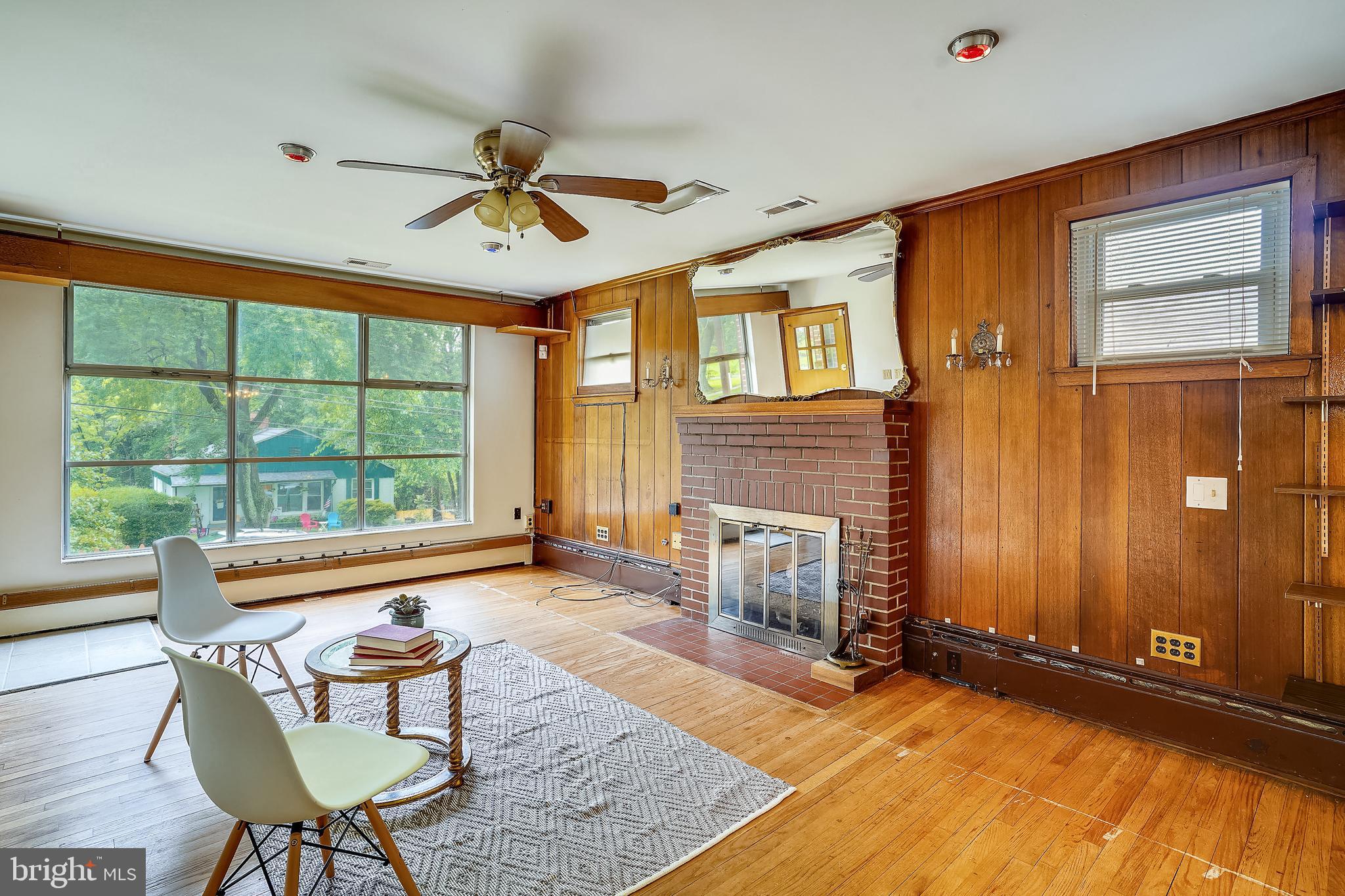 203 East Schuyler Road Silver Spring, MD 20901 - Photo 6 of 37 Living room with fireplace