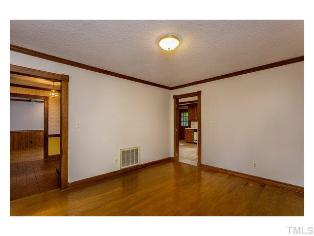 8205 Holly Berry Court Raleigh, NC 27615 - Photo 13 of 24 a view of an empty room