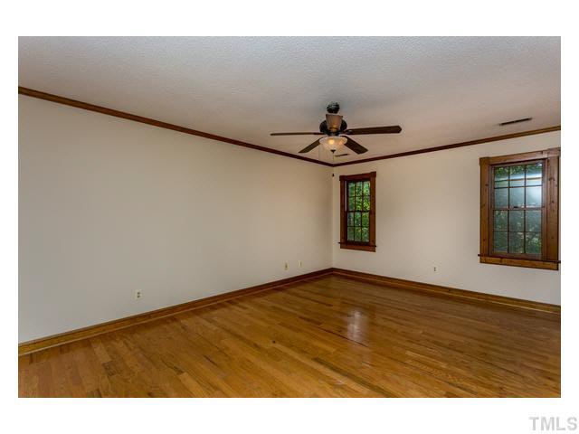 8205 Holly Berry Court Raleigh, NC 27615 - Photo 15 of 24 a view of an empty room