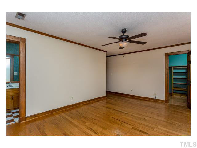8205 Holly Berry Court Raleigh, NC 27615 - Photo 16 of 24 a view of an empty room
