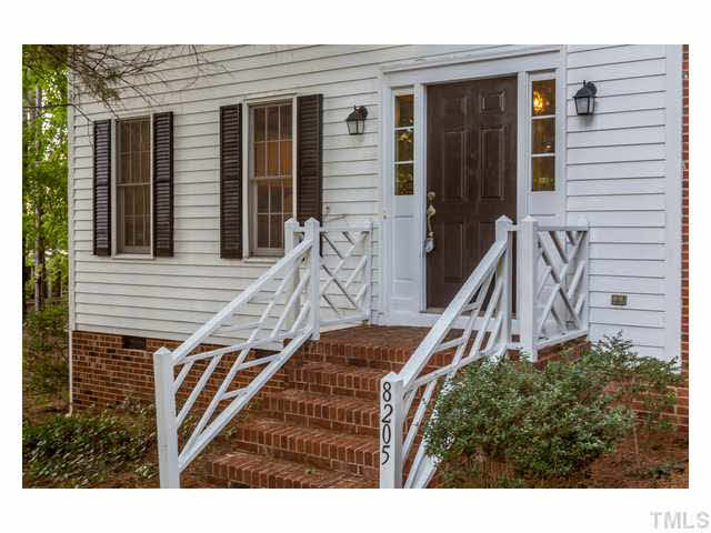 8205 Holly Berry Court Raleigh, NC 27615 - Photo 2 of 24 a view of a house with couches