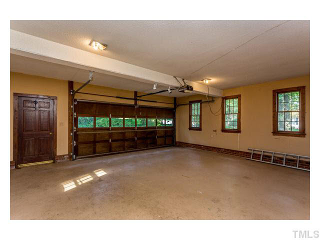 8205 Holly Berry Court Raleigh, NC 27615 - Photo 21 of 24 a view of a garage