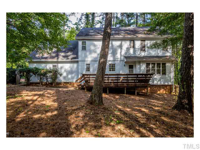 8205 Holly Berry Court Raleigh, NC 27615 - Photo 22 of 24 a view of a house with a yard