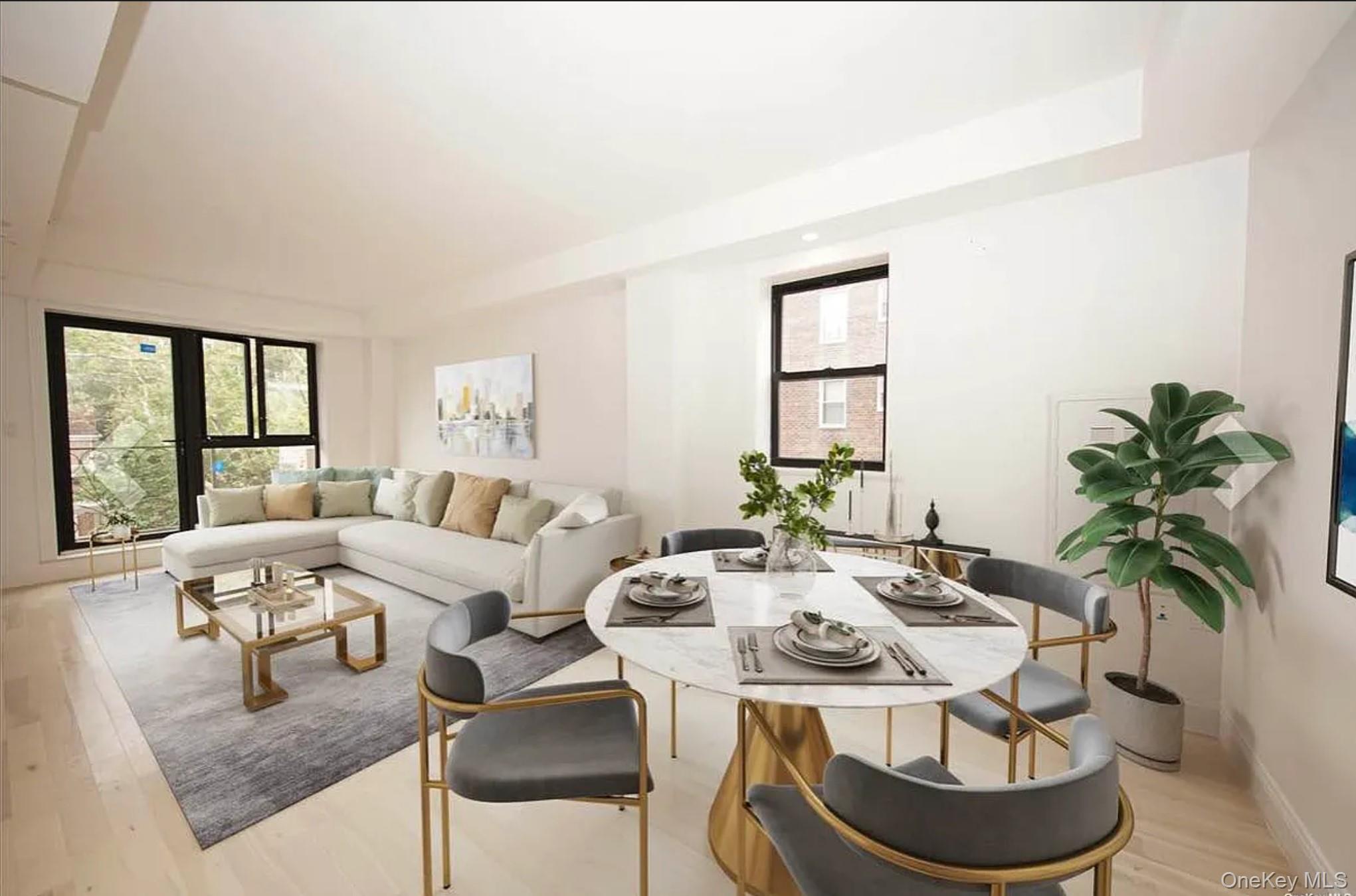 105-25 65th Road, Unit 5C Queens, NY 11375 - Photo 3 of 8 a living room with furniture and a large window