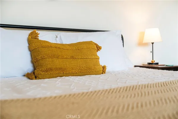 a view of a swimming pool with a balcony