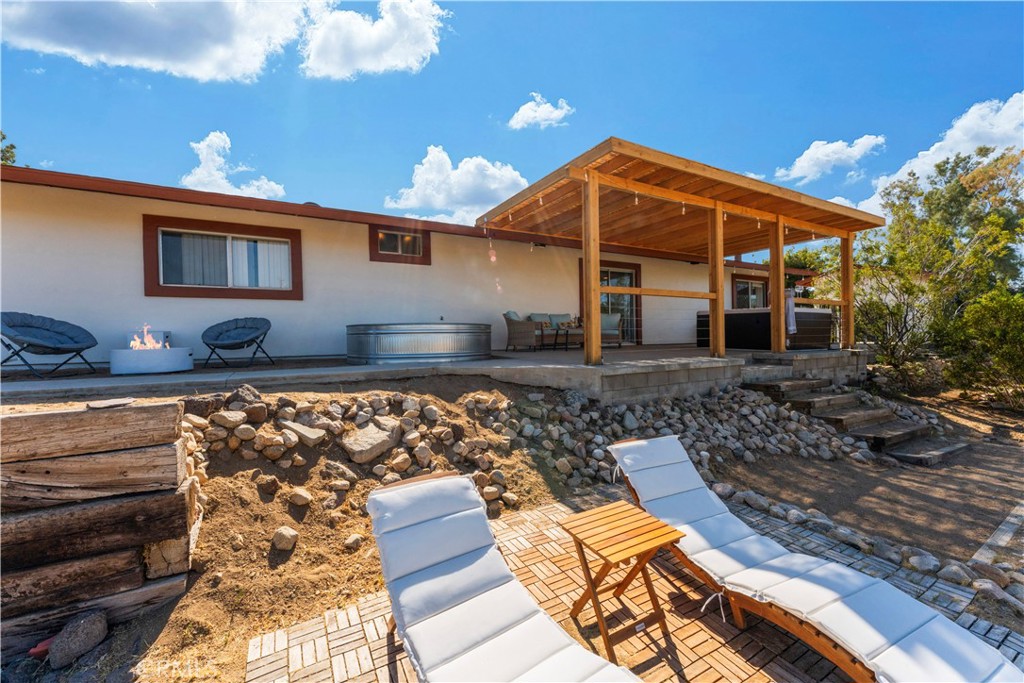 7071 Rubidoux Avenue Yucca Valley, CA 92284 - Photo 47 of 50 a front view of a house with garden