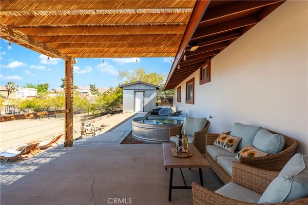 a view of outdoor space with seating area
