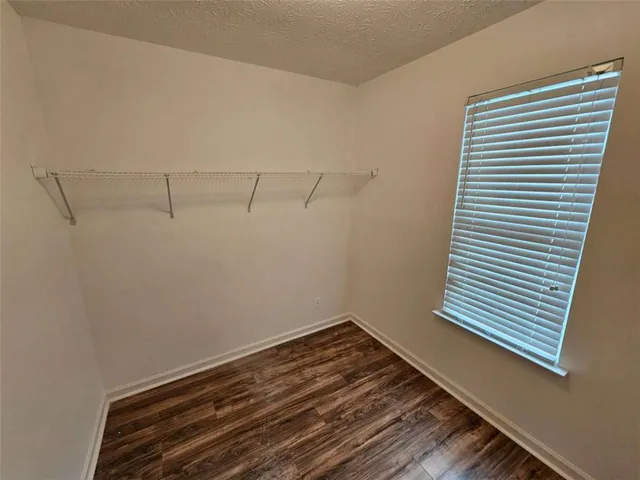 a view of a room with racks on the wall