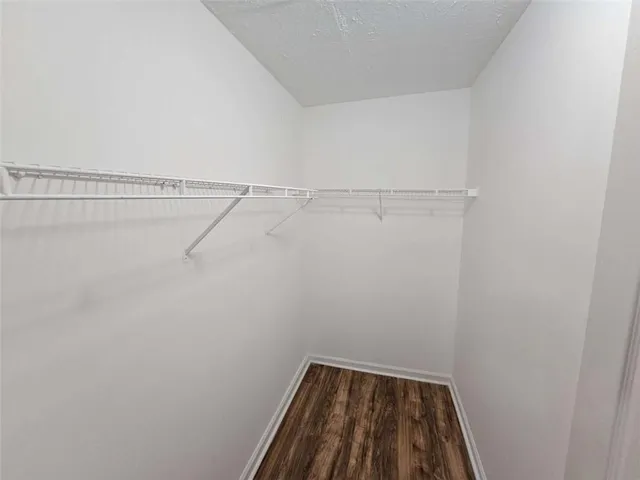 a view of a room with racks on the wall