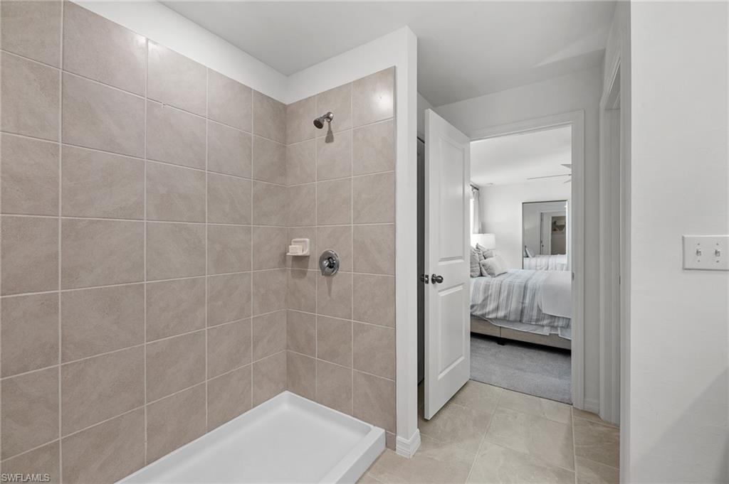 17251 Monte Isola Way North Fort Myers, FL 33917 - Photo 30 of 39 a bathroom with a sink and shower