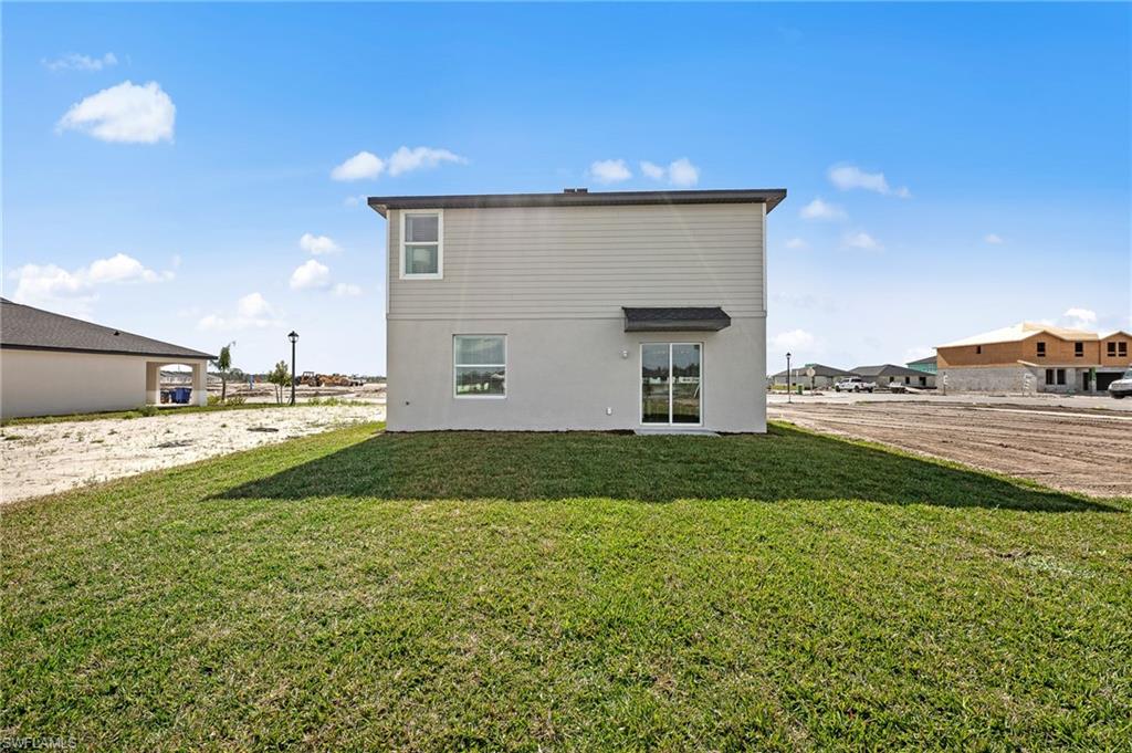 17251 Monte Isola Way North Fort Myers, FL 33917 - Photo 37 of 39 a view of a back yard of the house