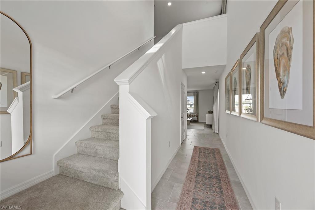 17251 Monte Isola Way North Fort Myers, FL 33917 - Photo 4 of 39 a view of a hallway view with staircase