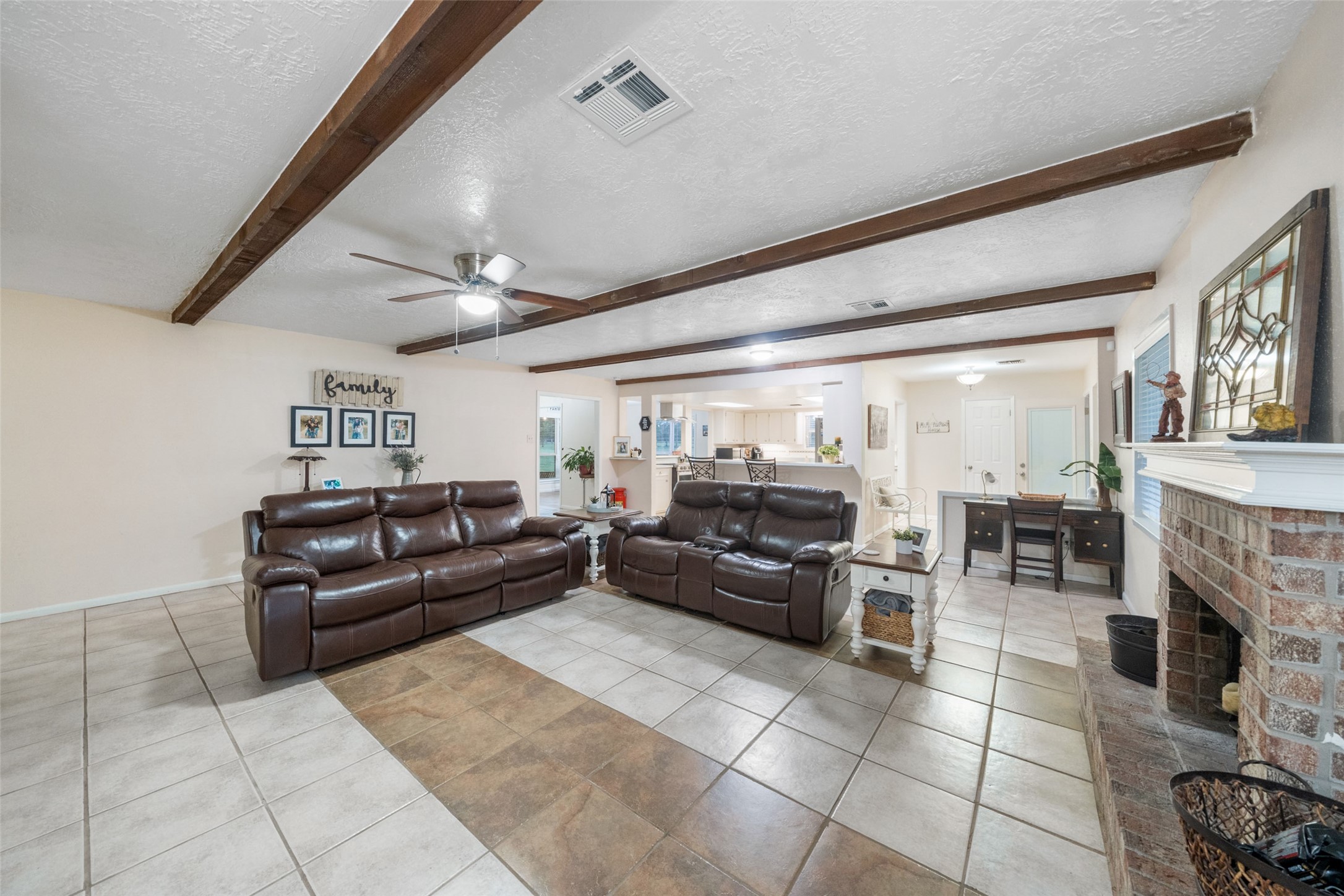 21348 Farm To Market 359 Hempstead, TX 77445 - Photo 17 of 48 a living room with furniture and a fireplace