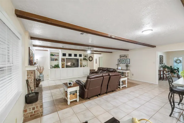 a bathroom with a double vanity sink mirror and shower