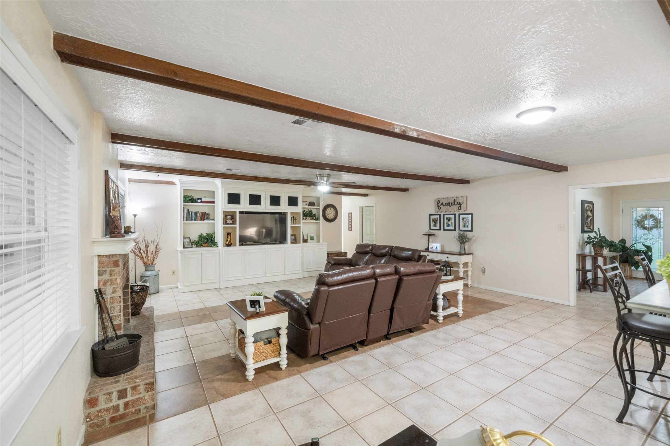 21348 Farm To Market 359 Hempstead, TX 77445 - Photo 18 of 48 a living room with furniture a dining table and chairs