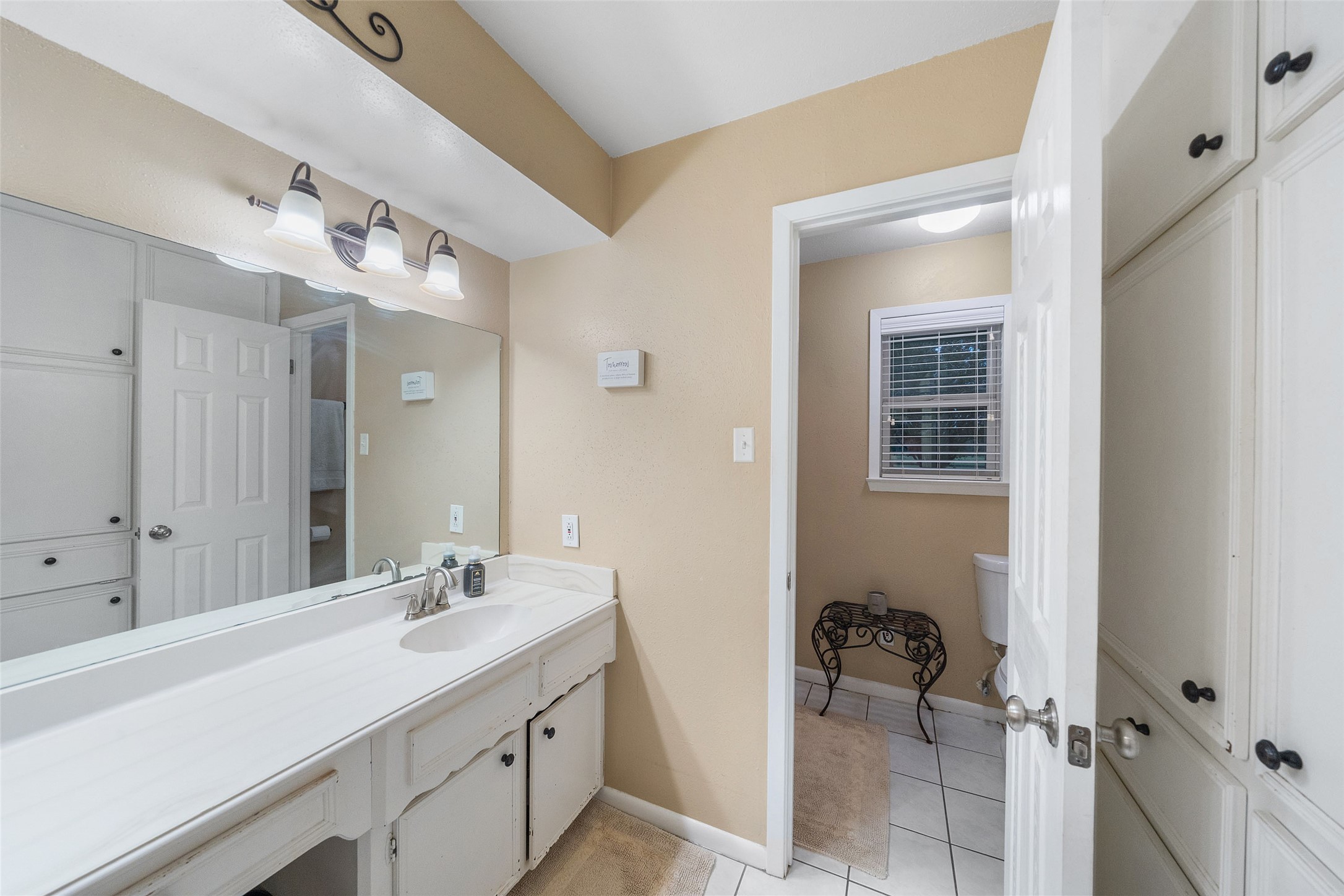 21348 Farm To Market 359 Hempstead, TX 77445 - Photo 25 of 48 a bathroom with a double vanity sink mirror and shower