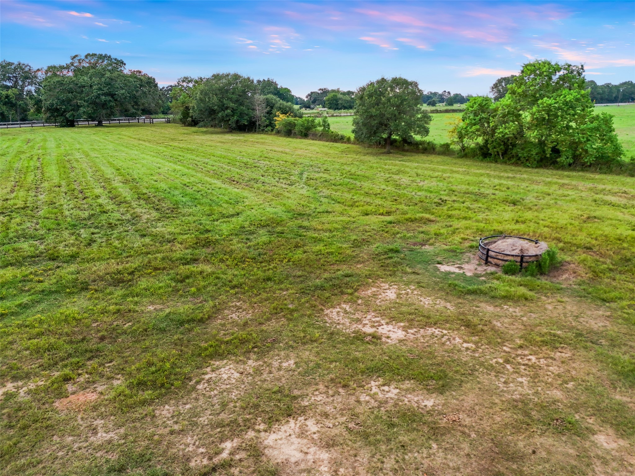 21348 Farm To Market 359 Hempstead, TX 77445 - Photo 38 of 48 a view of a green field with wooden fence