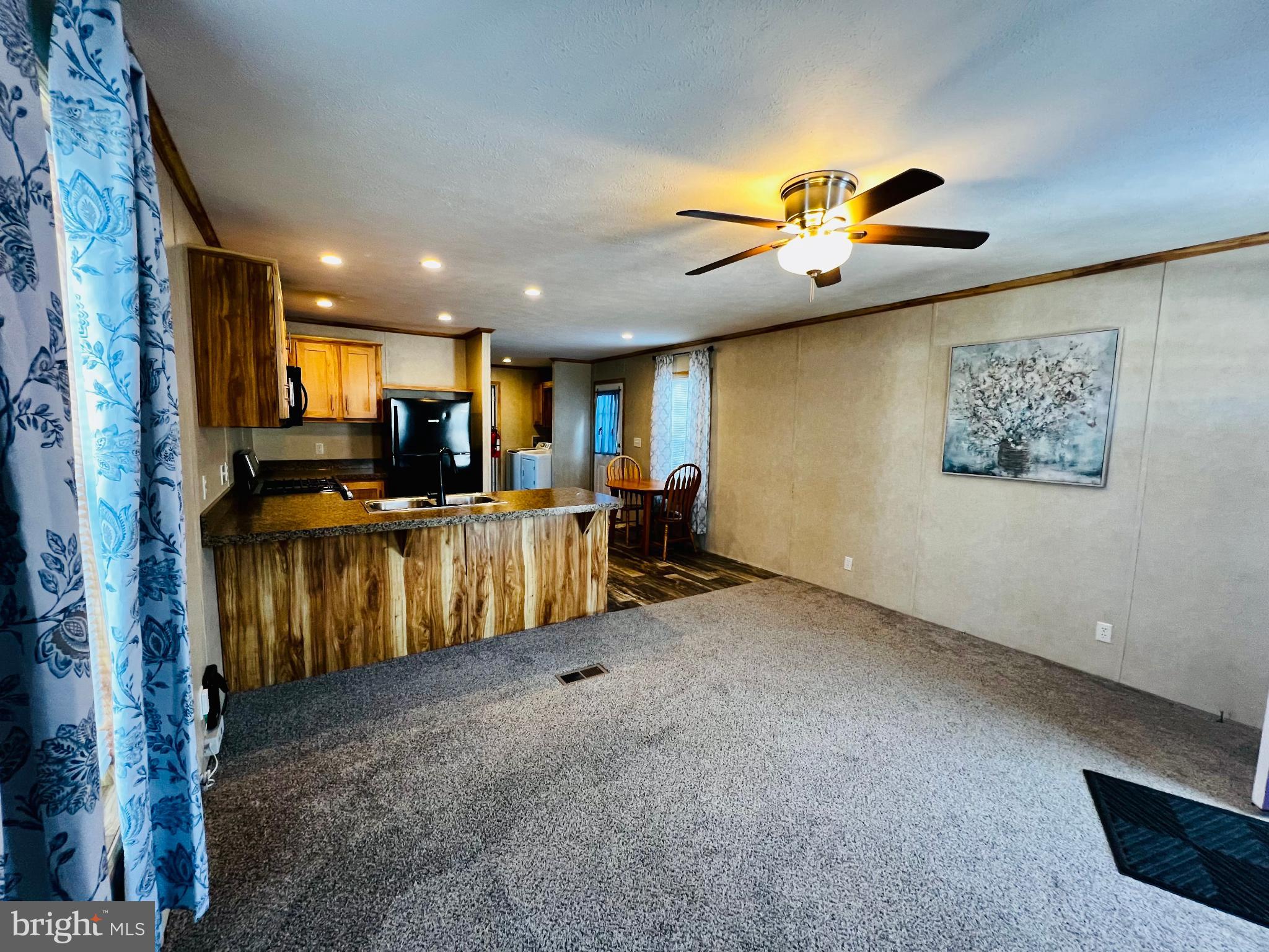 222 Kennedy Avenue Williamstown, NJ 08094 - Photo 2 of 10 a view of kitchen with refrigerator cabinets and furniture