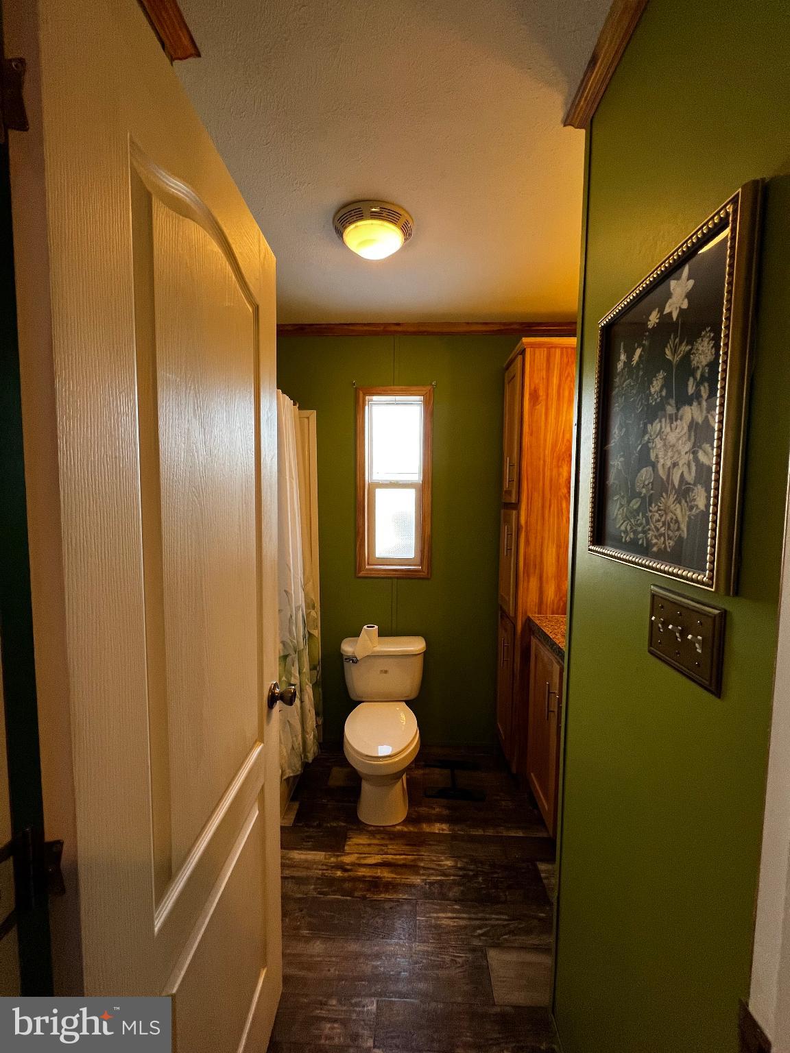 222 Kennedy Avenue Williamstown, NJ 08094 - Photo 8 of 10 a bathroom with a granite countertop sink and a mirror