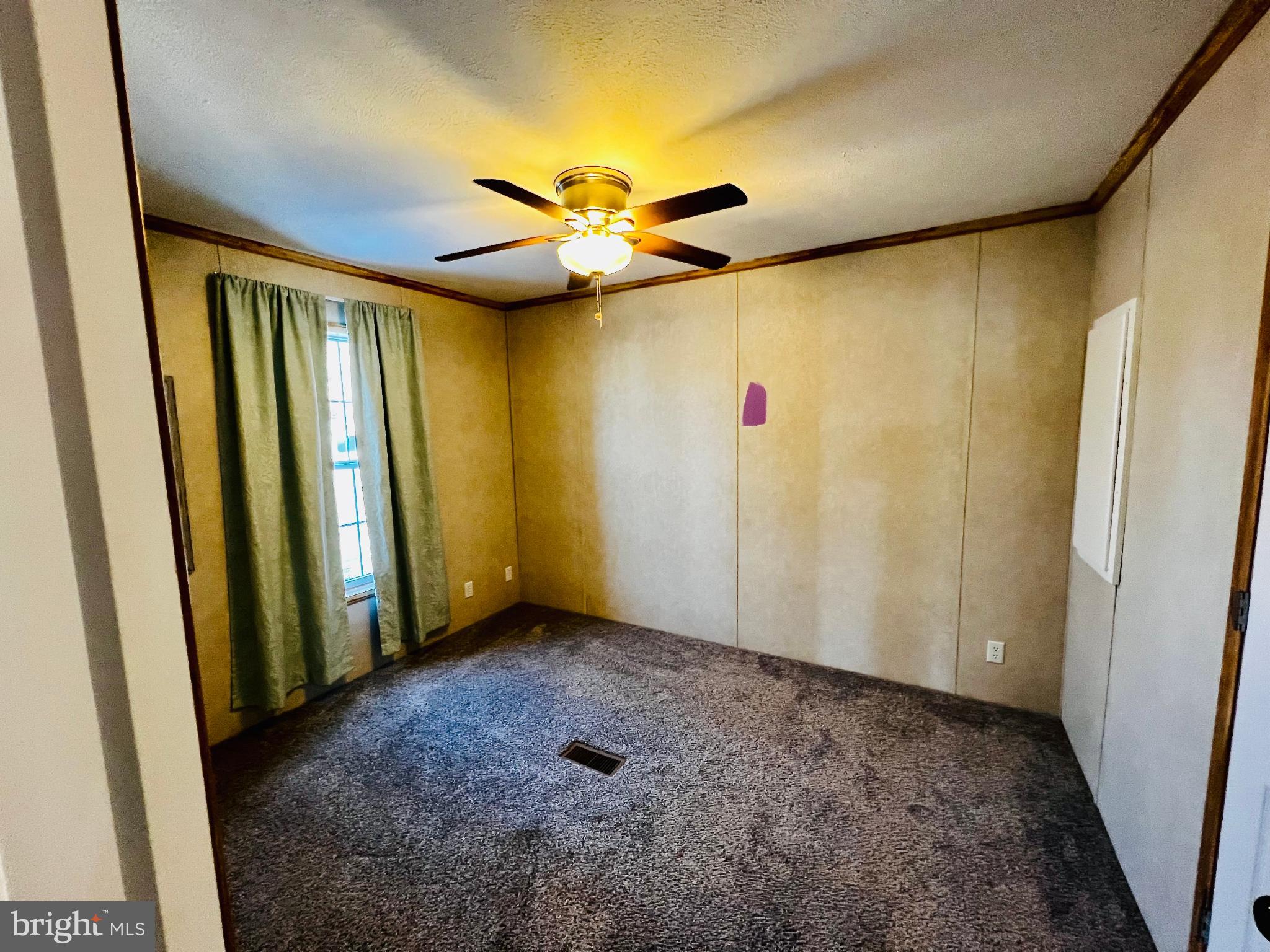 222 Kennedy Avenue Williamstown, NJ 08094 - Photo 9 of 10 a view of a hallway with a chandelier fan