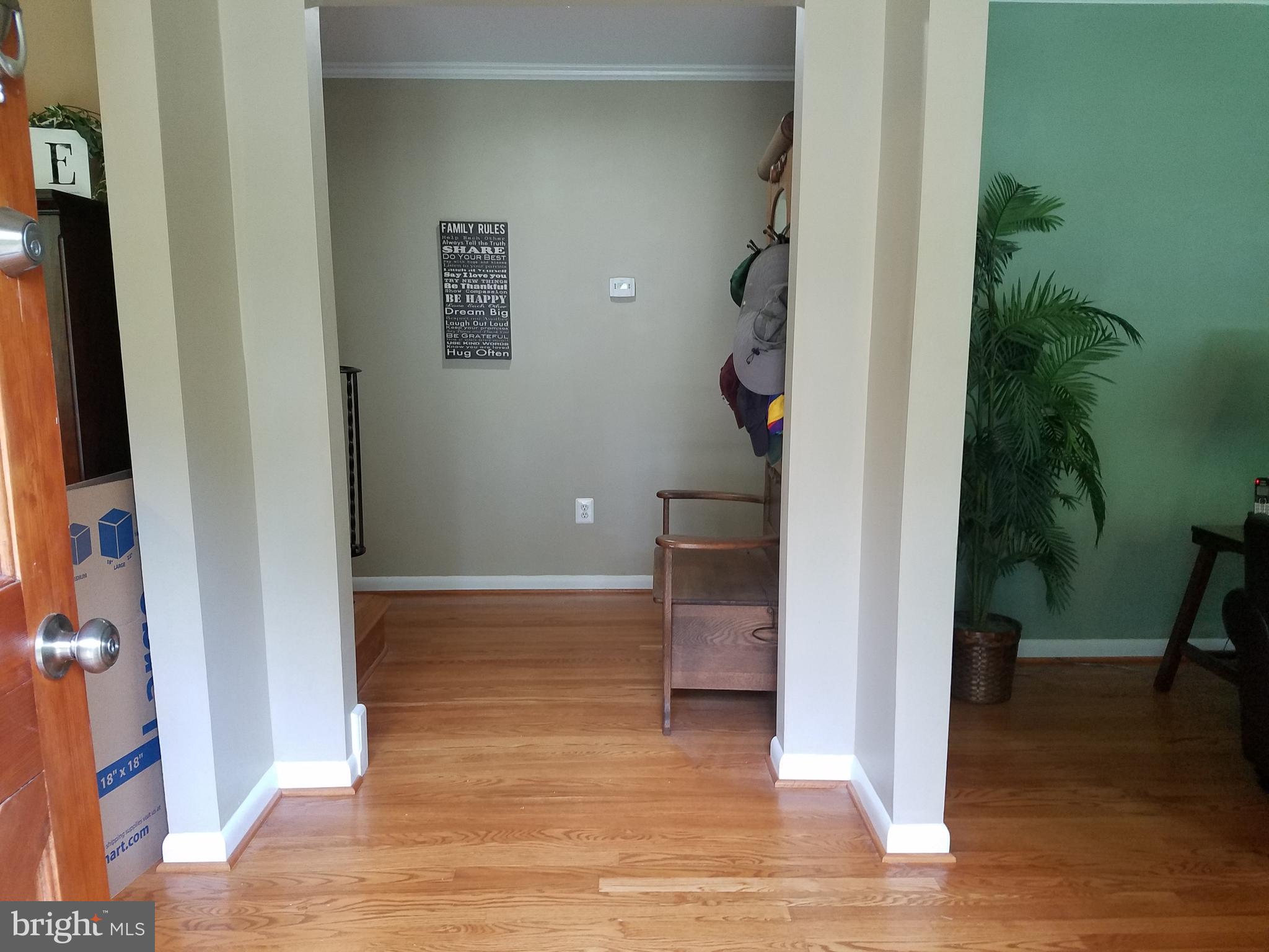 Hardwood floors and entry foyer