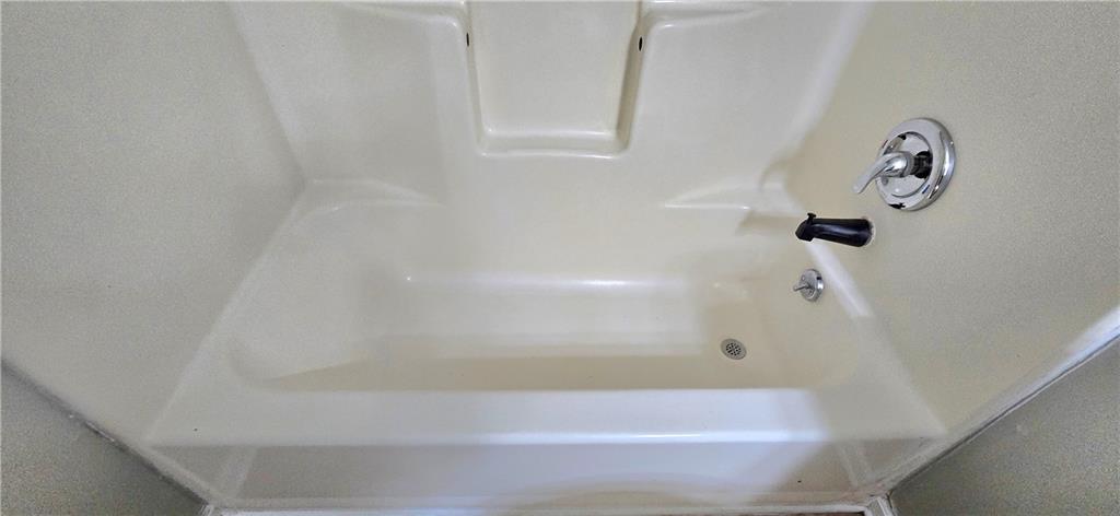 1120 Rappahannock Drive Alpharetta, GA 30009 - Photo 21 of 35 a bathroom with a bathtub